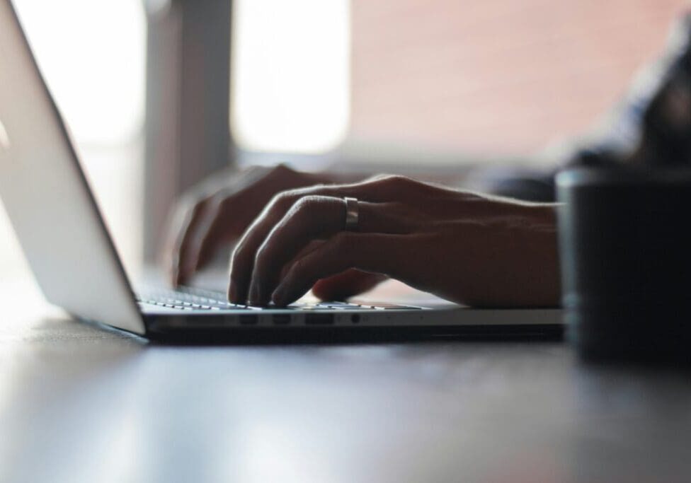 Person-working-on-laptop-scaled