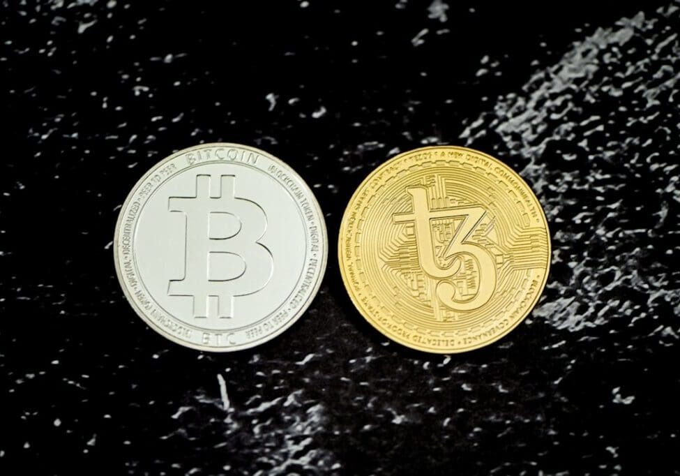 Bitcoin and Tezos cryptocurrency coins comparison