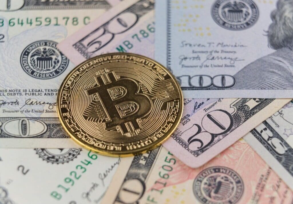Bitcoin on various US dollar bills