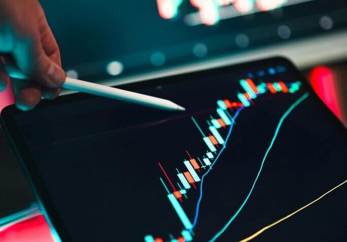 Analyzing tablet stock market charts trading