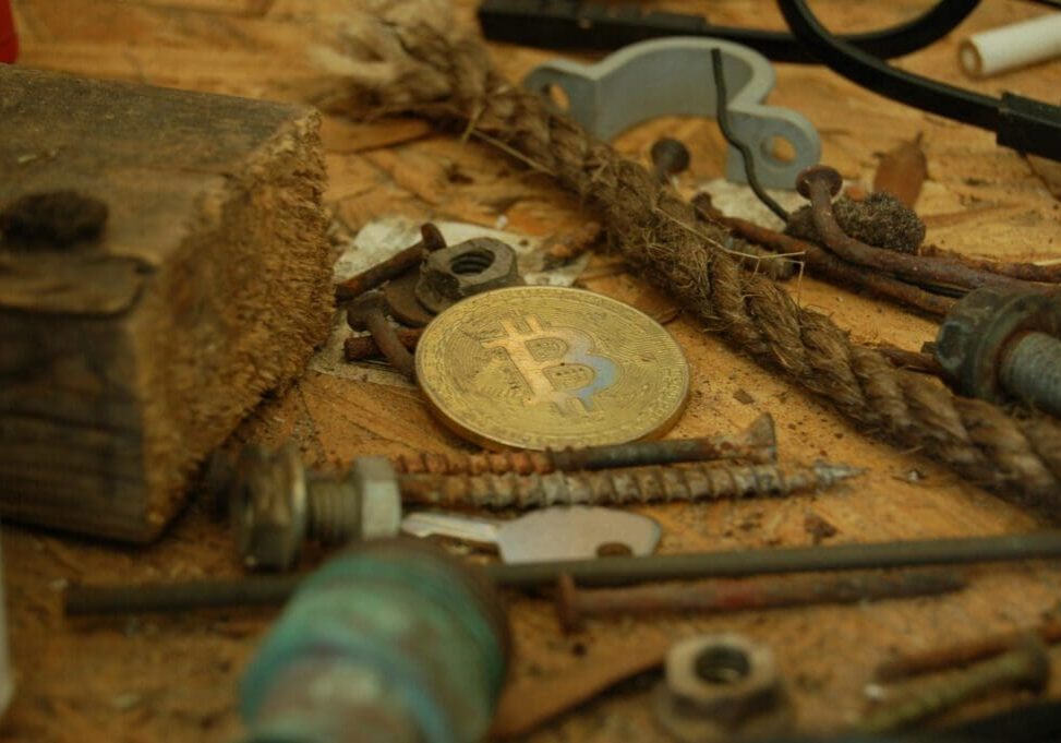 Bitcoin amidst rustic hardware and rope