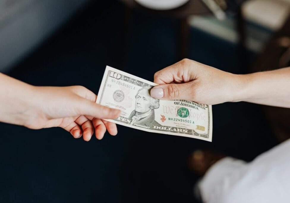 hand-to-hand-cash-payment-scaled