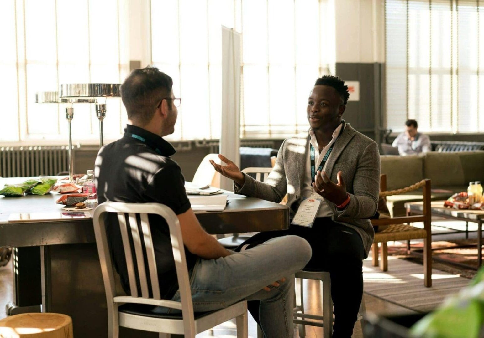 two-men-having-business-discussion-scaled